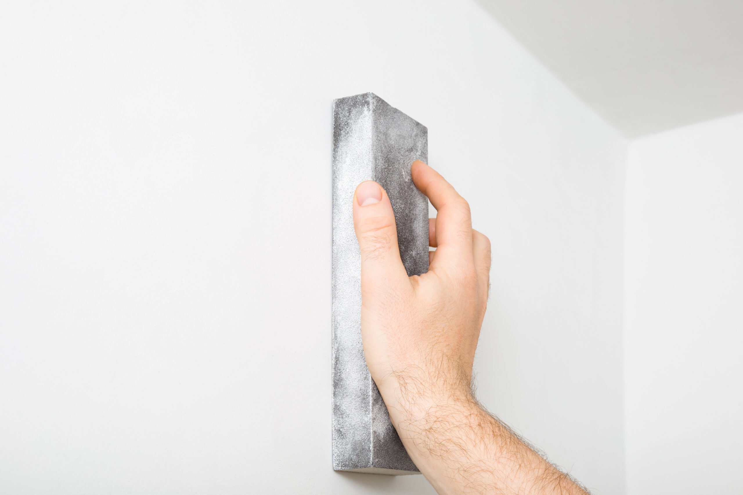 A professional from Dixon Painting is providing sanding and prep work services in Atlanta, GA